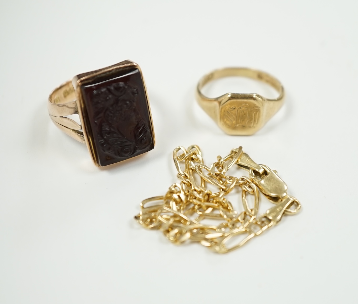 A modern 9ct gold and hardstone cameo set ring, size M, a small 9ct gold signet ring and an Italian 14kt bracelet